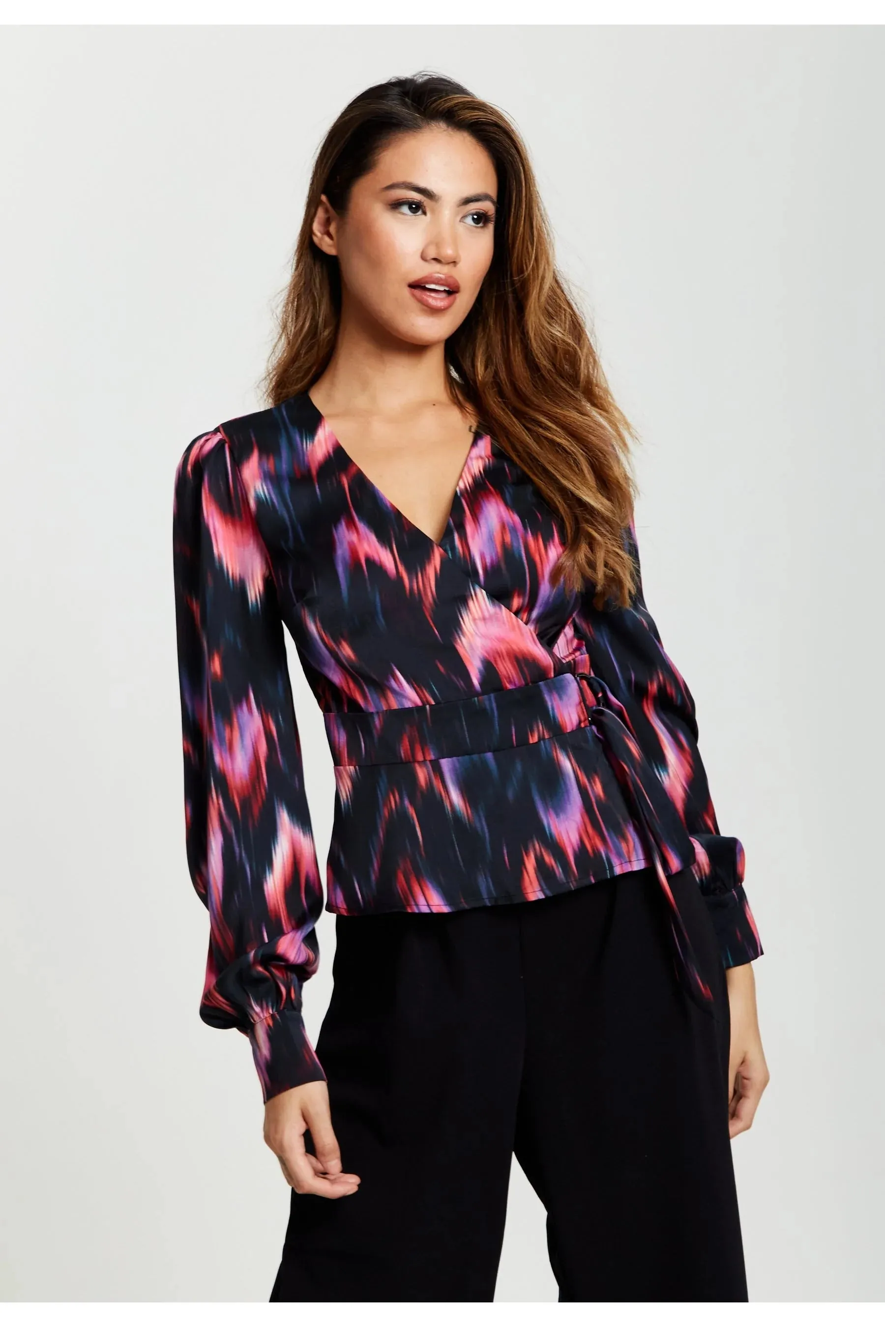 Liquorish black and abstract feather print wrap top