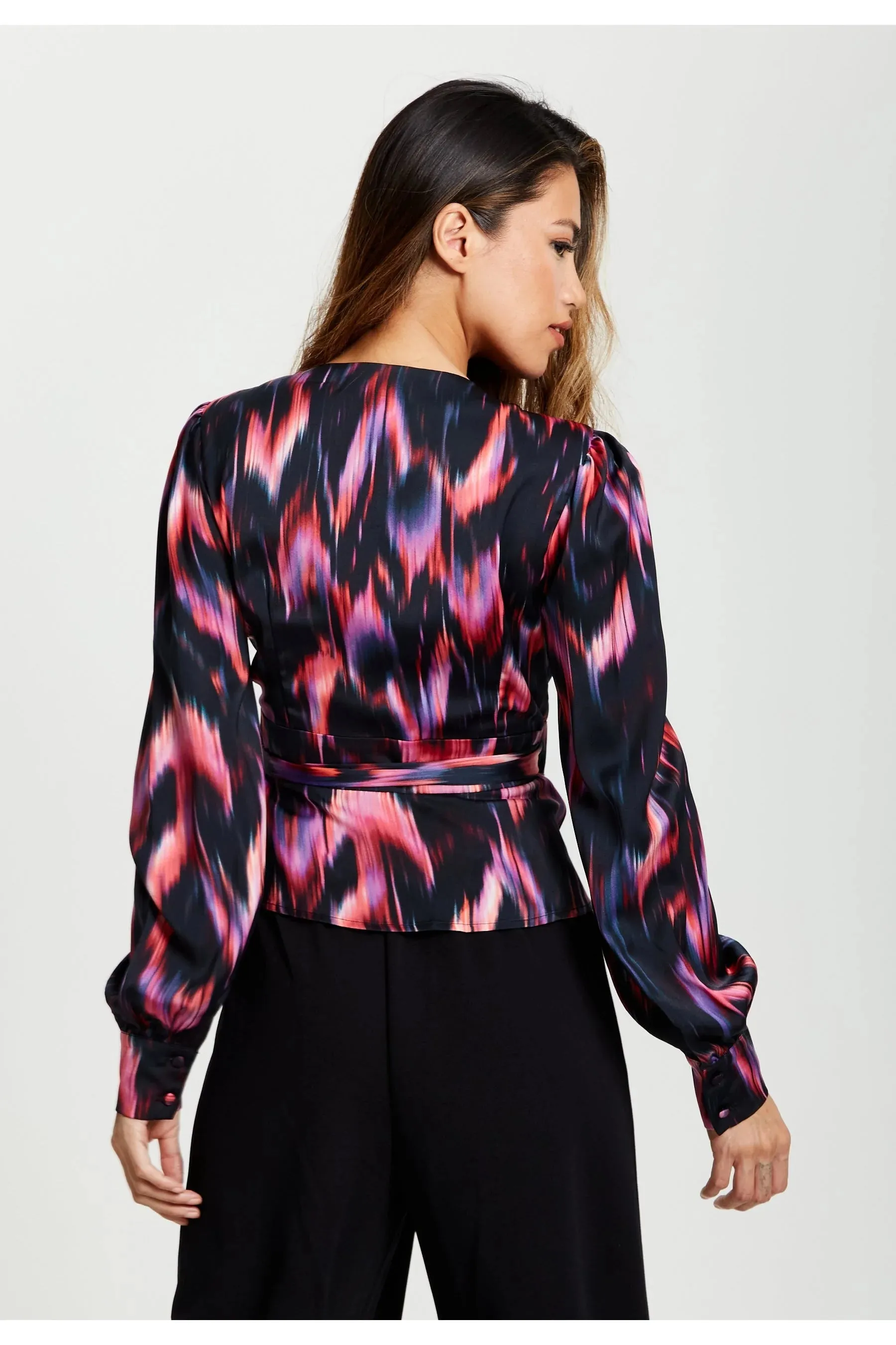 Liquorish black and abstract feather print wrap top