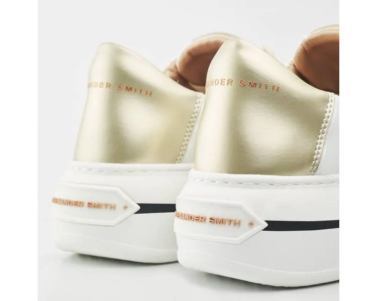 Women's gold Alexander Smith Lancaster sneakers.